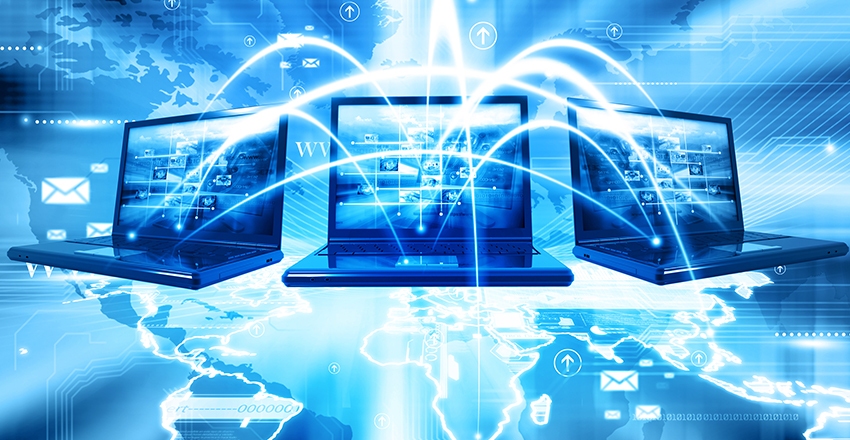 decorative image of three laptops appearing to exchange information in the cybersphere