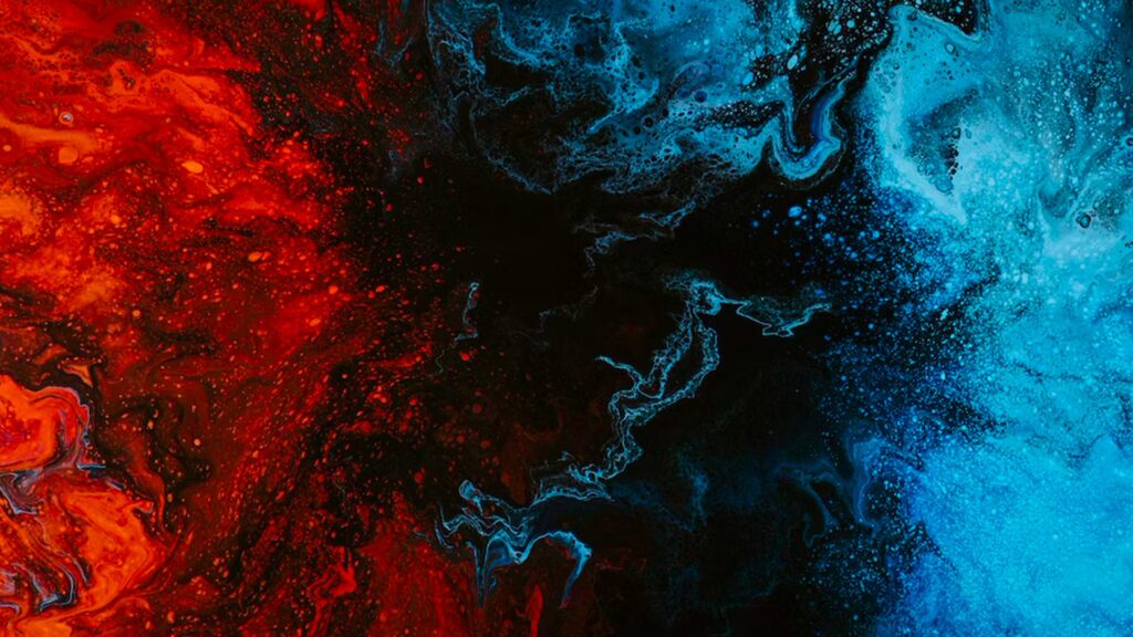A red cloud meets a blue cloud, creating a black space in the middle to illustrate how third party risk can occur when integrating a new vendor into your network.