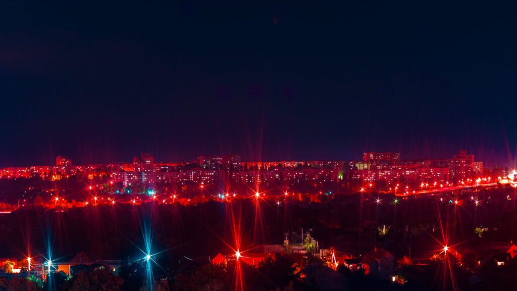 a harbor at night with red lights to emphasize the need for red team testing to achieve fedramp authorization