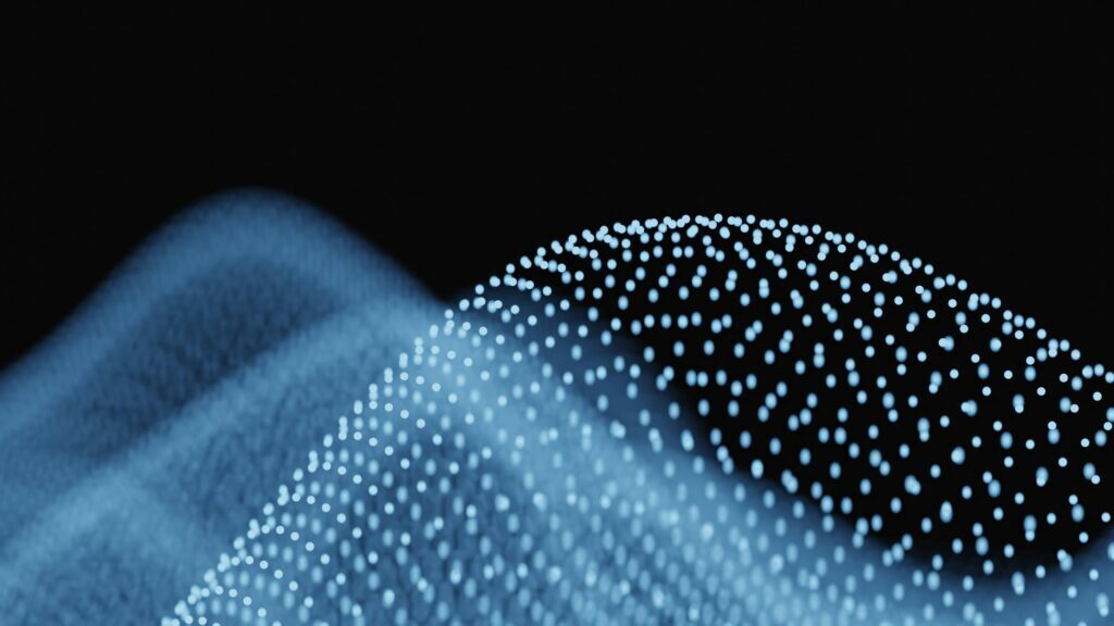 Abstract visualization of a dynamic digital surface with flowing blue data points representing continuous cybersecurity monitoring and AI-driven analysis.