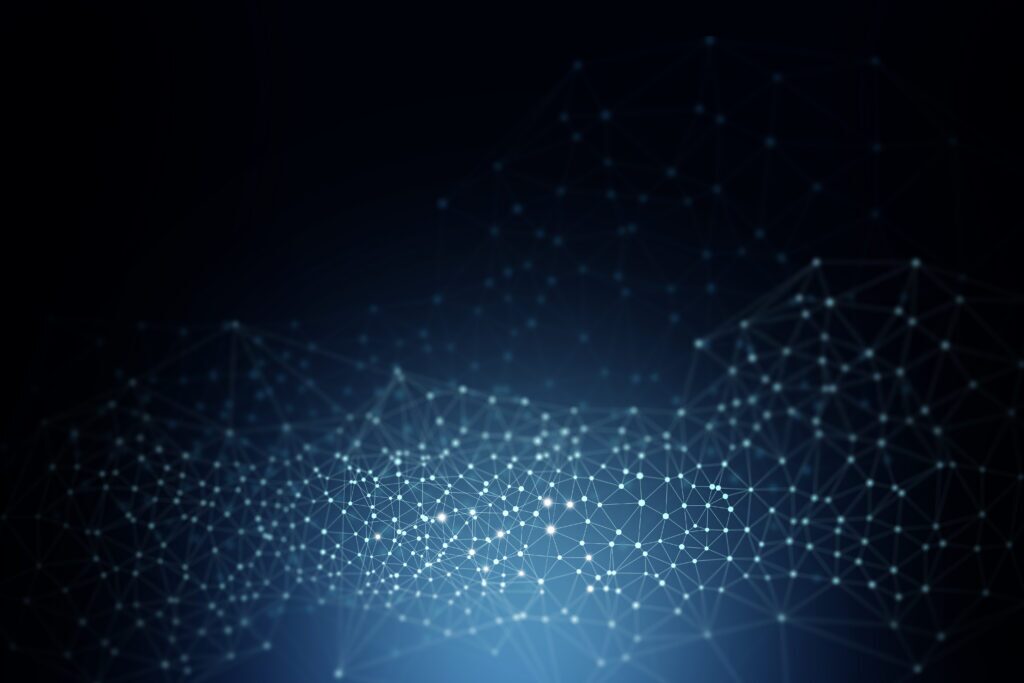 Low-poly network mesh illustration with glowing connected nodes and dots on a dark blue background, representing digital connectivity and cybersecurity technology.