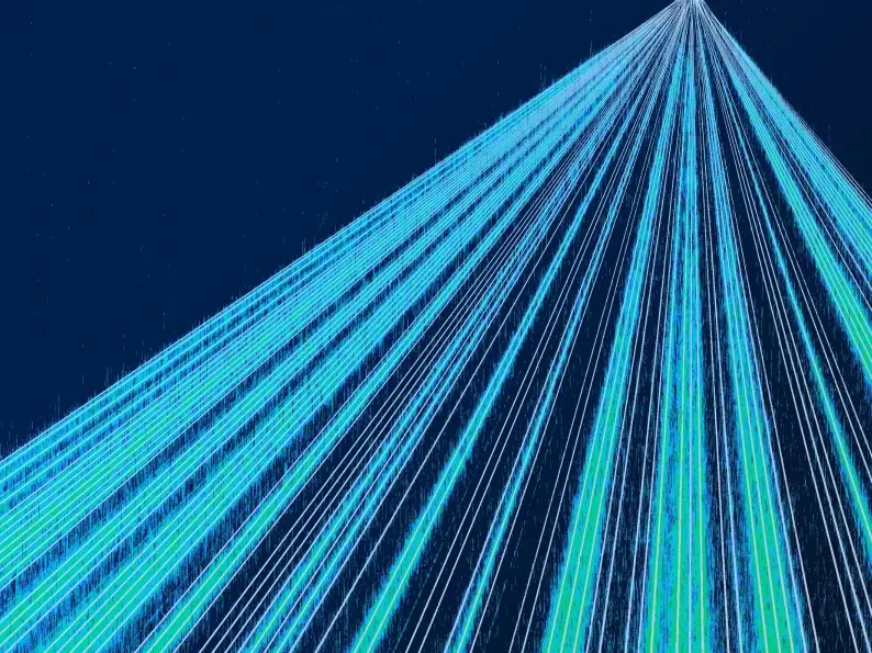 Abstract blue and green light lines converging to a single point on a dark background.